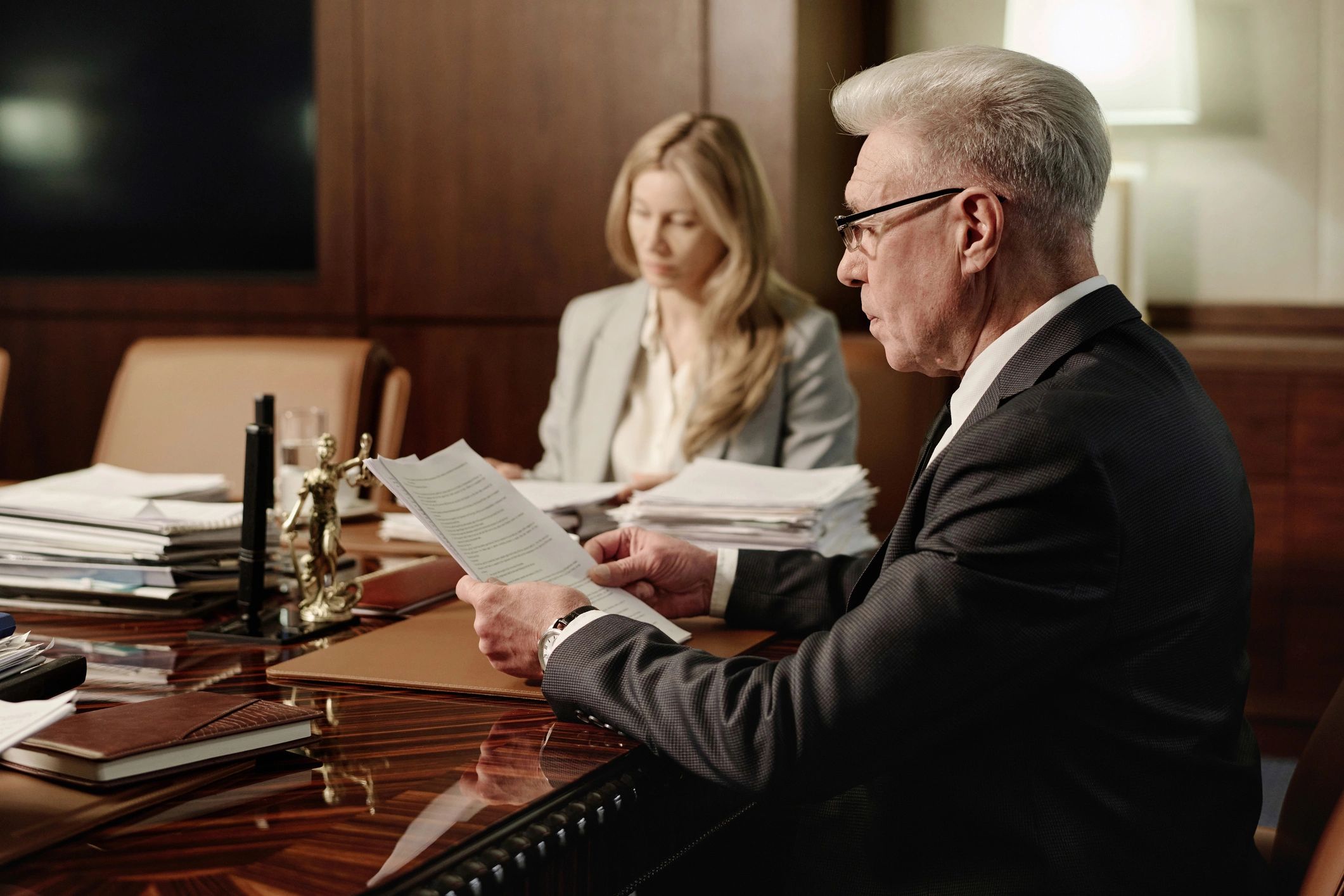 Attorney meeting with a client in an office
